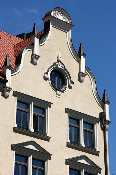 Decorative windows of old building in Munich, Germany