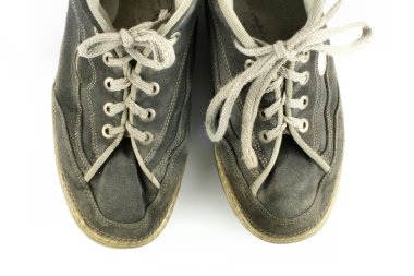 Worn and dirty pair of shoes clipart