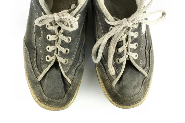 Stock image Worn and dirty pair of shoes