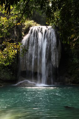 Beautiful waterfall in Thailand's Erawan Waterfalls National Park. Kanchanaburi region. clipart