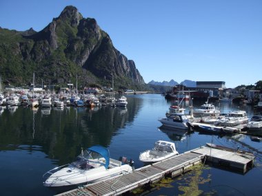 A marina in Norway. Motorboats and yachts. clipart