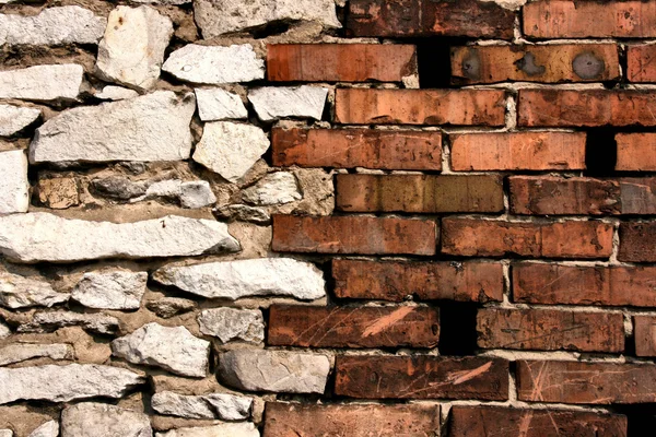 Brick and stone walls joint — Stock Photo, Image