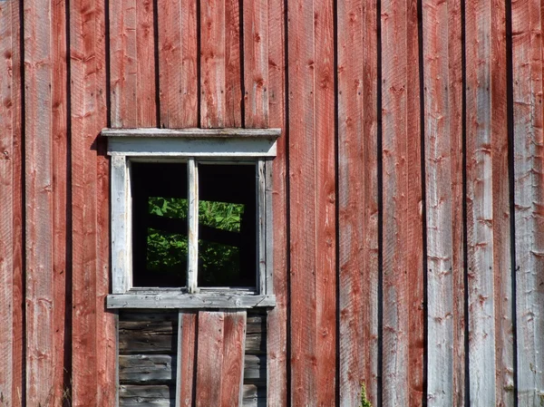 stock image Empty window without glass in an old Norwegian farm building.