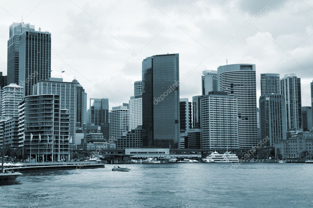 Sydney waterfront. Skyscrapers next to harbor. Modern city in Australia.