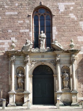 Beautiful church in Estonia. Tallinn religious architecture. Saint sculptures and statues. clipart