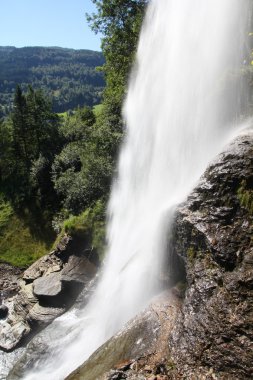 Norway, Hordaland county. Famous Steinsdalsfossen waterfall. Scandinavian nature. clipart