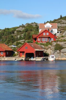 Norway - Skjernoy island in the region of Vest-Agder. Small fishing town - Dyrstad (also known as Dyrestad). clipart