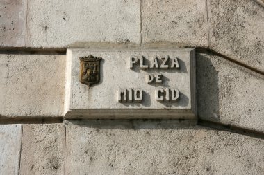 Plaza de Mio Cid in Burgos, Spain - town square old name board. clipart