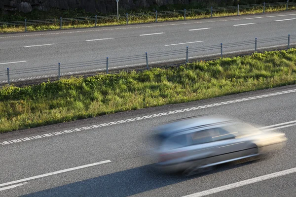 stock image Car in motion on European road E18 in Norway. Highway traffic.