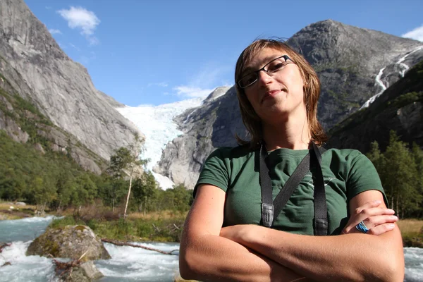 stock image Pretty girl hiking in Norway, Jostedalsbreen National Park.