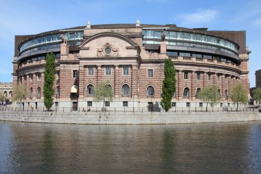 Stockholm, Sweden. Riksdag (parliament) building at Helgeandsholmen island. clipart