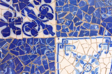 Blue mosaic in Antoni Gaudi's Park Guell clipart