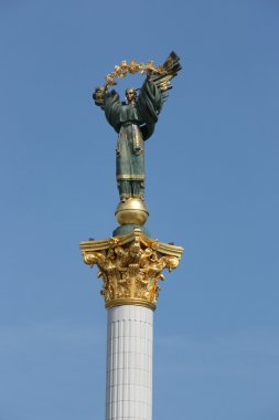 Famous statue on a column in Kiev, Ukraine clipart