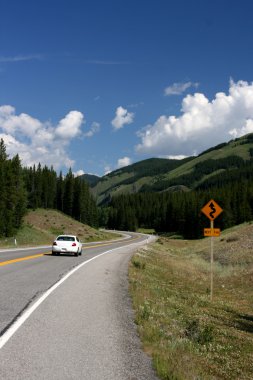 Kananaskis Country Provincial Park. Road and beautiful mountain vista. clipart