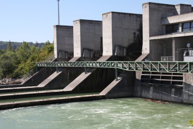 Hydro power plant on Traun river in Marchtrenk, Austria. Concrete dam. clipart