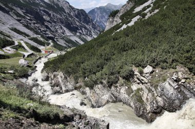 Italy, Stelvio National Park. Famous road to Stelvio Pass in Ortler Alps. Alpine landscape. clipart