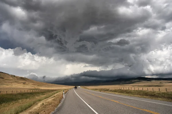 stock image Prairie road in Alberta, Canada. Imminent storm.