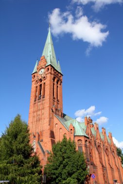Poland - Bydgoszcz, city in Kuyavia (Kujawy) region. Church of Saint Andrew Bobola, neogothic landmark. clipart