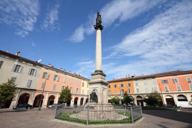 Piacenza, Italy - Emilia-Romagna region. Virgin Mary column at Piazza Duomo. clipart