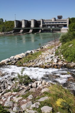 Hydro power station on Traun river in Marchtrenk, Austria. Concrete dam. clipart