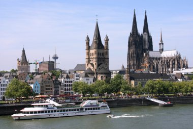Cologne, Germany - cityscape with Rhine river and famous cathedral. Photo may seem tilted to the left - optical illusion.