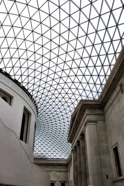 Incredible interior of Great Hall in British Museum, London, UK. Link between old and modern. clipart