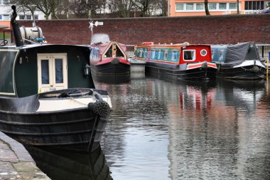 Birmingham water canal network - barge homes, typical houseboats. West Midlands, England. clipart