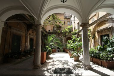 Mysterious atrium in Parione district of Rome, Italy clipart