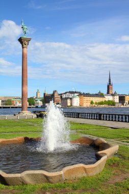 Stockholm, Sweden. Column with famous Engelbrekt monument and Gamla Stan in the background. clipart