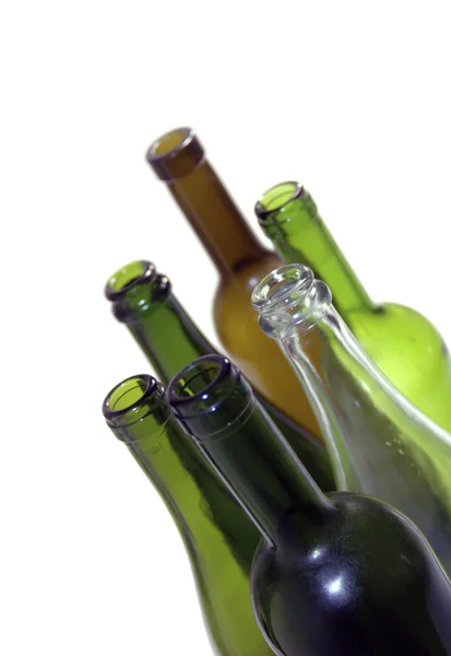 stock image Composition with glass wine bottles of various colors