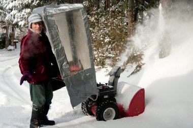 Man behind snow blower clipart