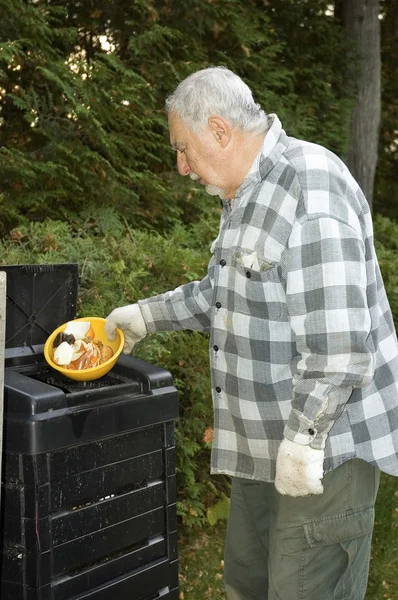 Senior ecologist and compost container — Stock Photo, Image