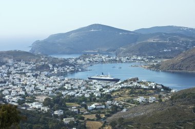 Cityscape and harbor of Skala clipart