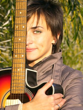 Pretty women with guitar clipart