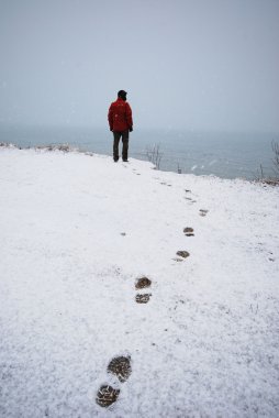 Foot steps on the snow clipart