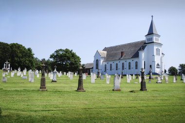 A church and the graveyard clipart