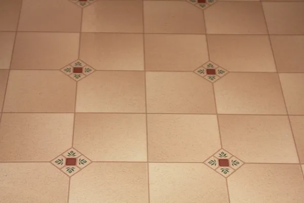 Kitchen Linoleum in Tan and Red Stock Image