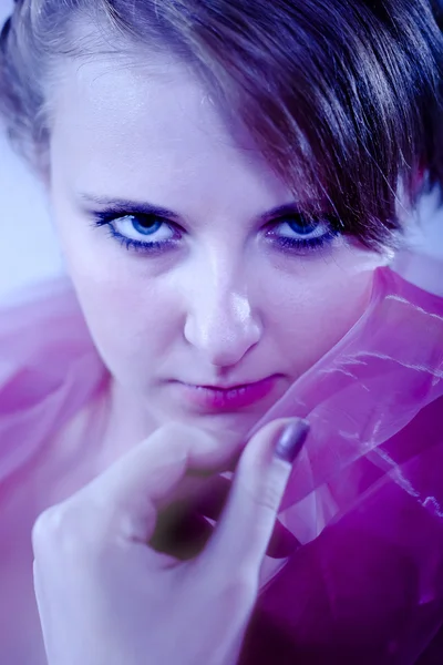 Portrait of girl in blue tones witn nand — Stock Photo, Image