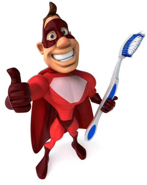 Супергерой и зубная щётка — стоковое фото