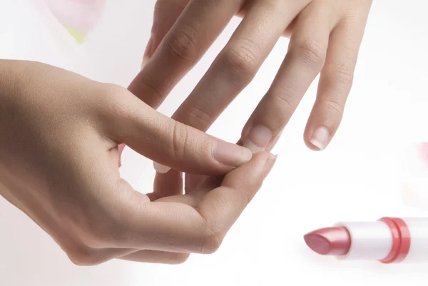 Lápiz labial de dedo y rosa —  Fotos de Stock