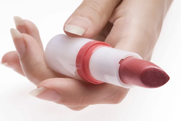 Vinger lippenstift en rose — Stockfoto