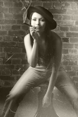 beautiful asian girl in a vintage blck and white shot with dust and scratches as an old film clipart