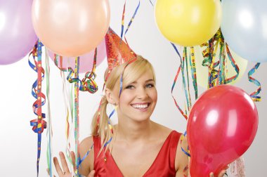 Red dressed girl in party with balloons clipart