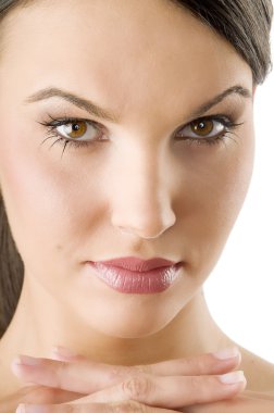 close up of attractive and beautiful girl with sensual eyes looking in camera clipart