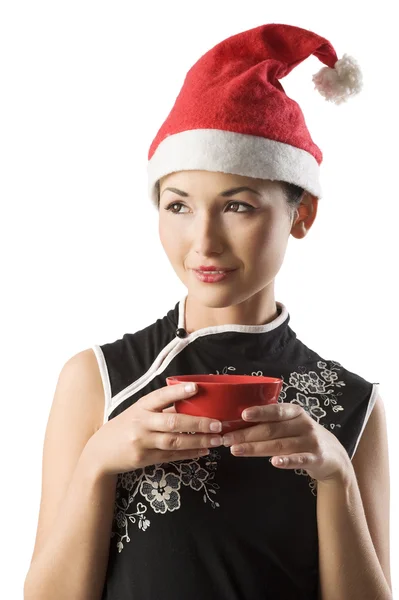 Aziatisch meisje met kerstman hoed — Stockfoto