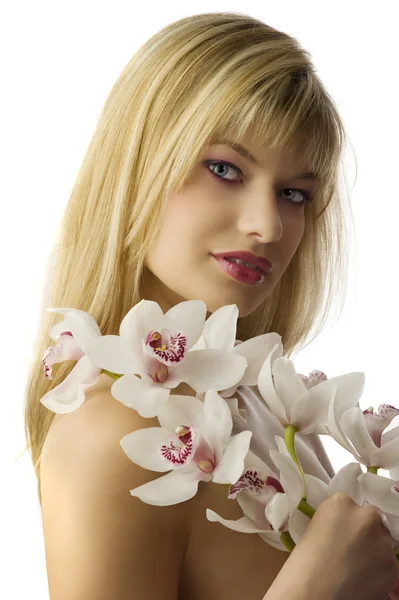Die Blondine mit Orchidee — Stockfoto