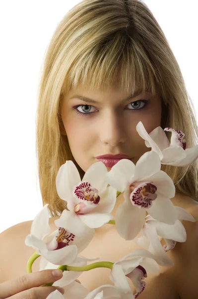 The eyes and orchid — Stock Photo, Image