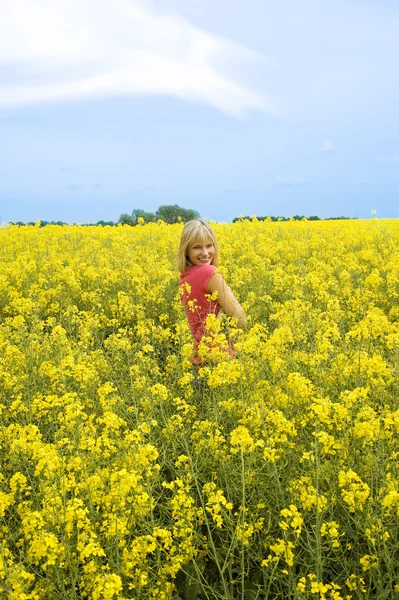 Cute Young Woman Pink Shirt Smiling Yellow Field — 스톡 사진