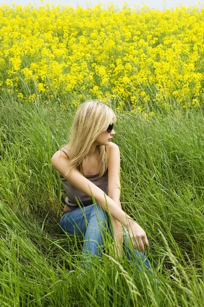 Very Cute Blond Woman Sitting Outdoor Grass Yellow Field — 스톡 사진