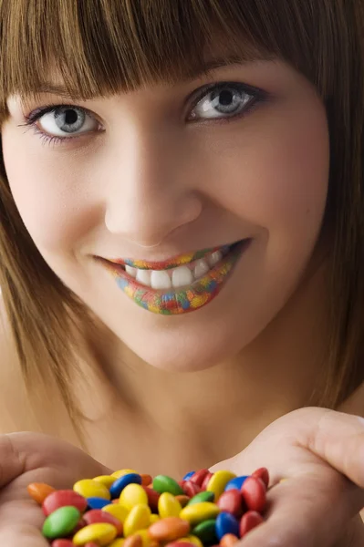 Young Pretty Girl Colored Smarties Hand Multi Color Lips Smiling — 스톡 사진